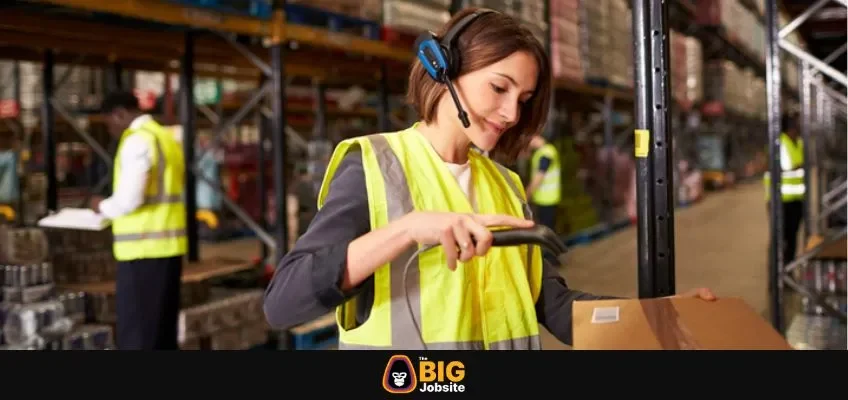 lady in warehouse with high-vis vest